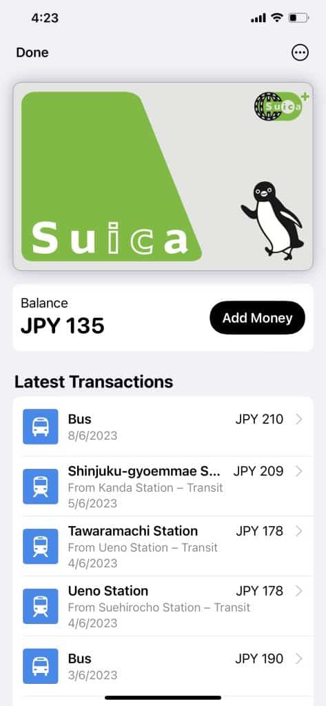 Screen shot showing how to add money to a digital Suica card in Japan. The card icon is shown with a large black button that says 'add money'. A list of trips charged to the card is shown below this.