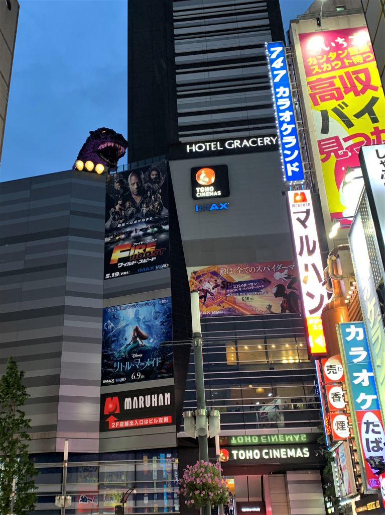 Godzilla head peers over the top of the Hotel Gracery in Tokyo