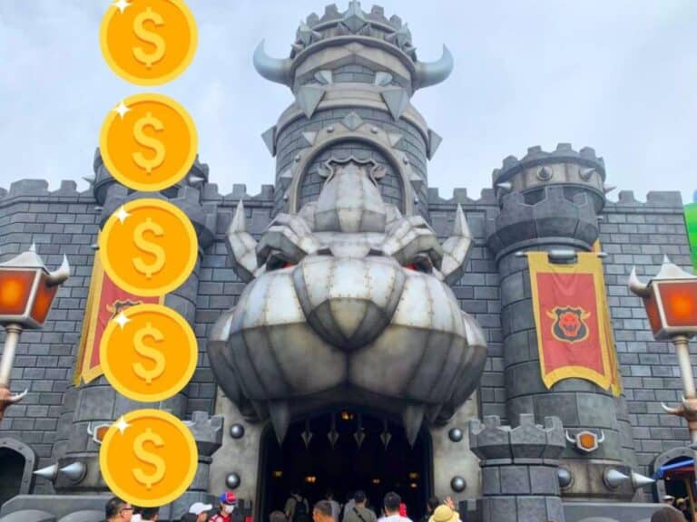 View of the outside of the Mario Kart ride in USJ with coins with dollar signs over the top