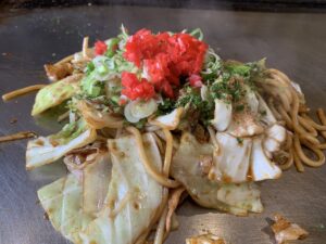 yaki soba being cooked on the hot plate in Takayama