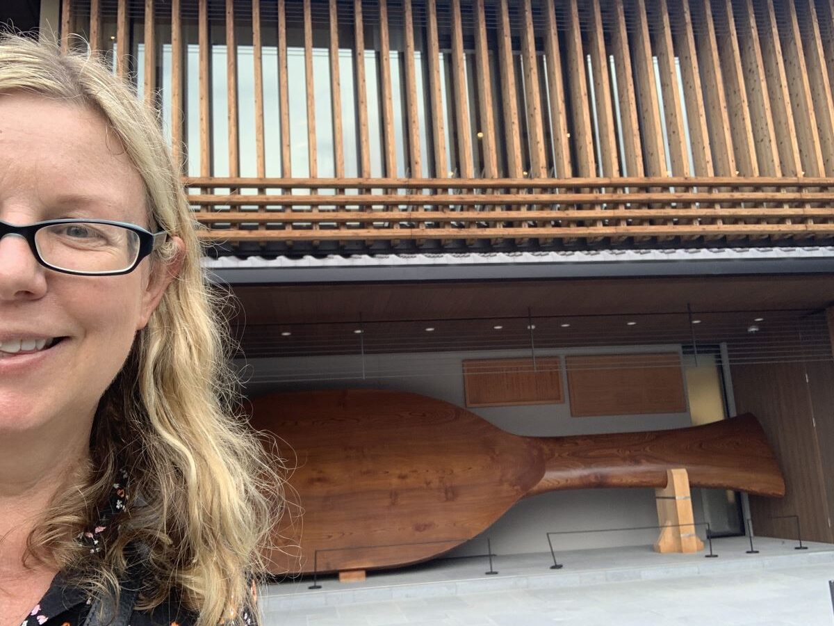 Helen from Japlanese stands next to the big rice scoop on Miyajima