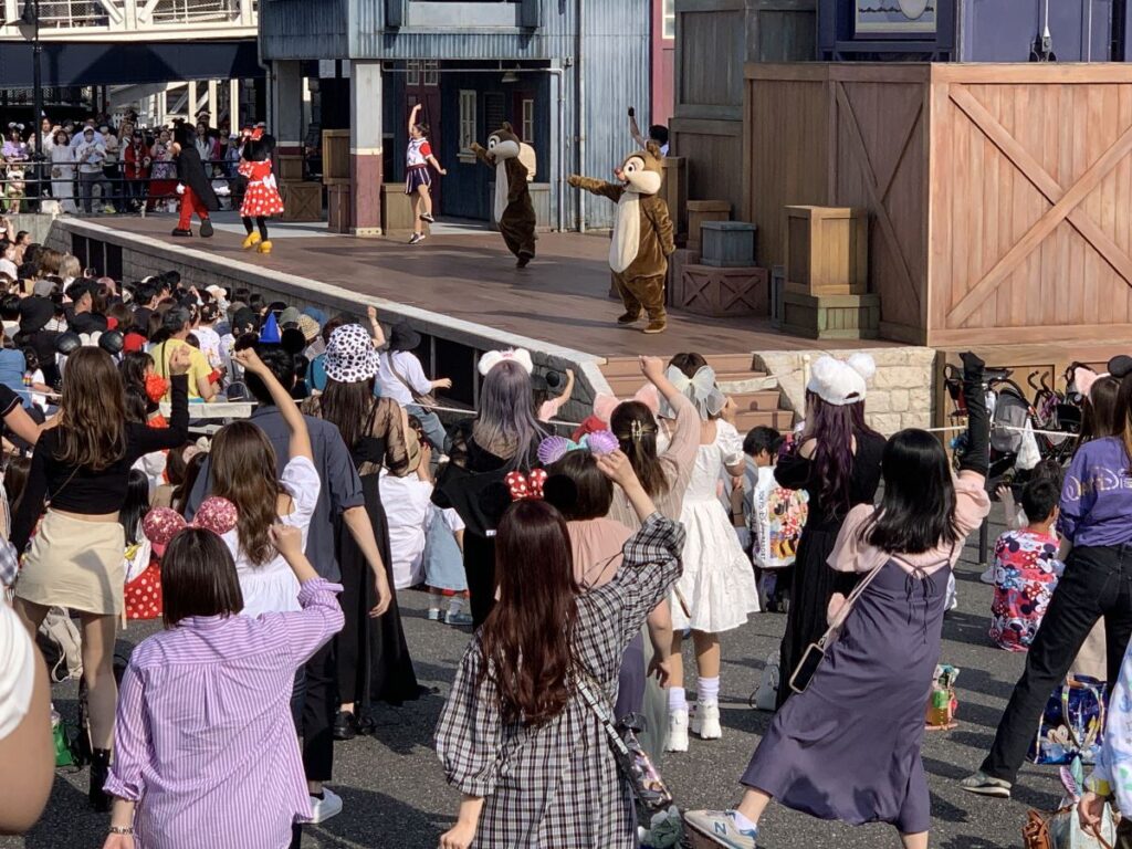 Local guests dance along to the show in Tokyo DisneySea
