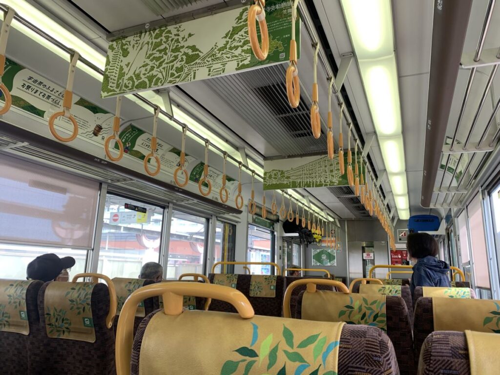 Inside of the tourist friendly Loop bus in Nara - the yellow interior matches the exterior.