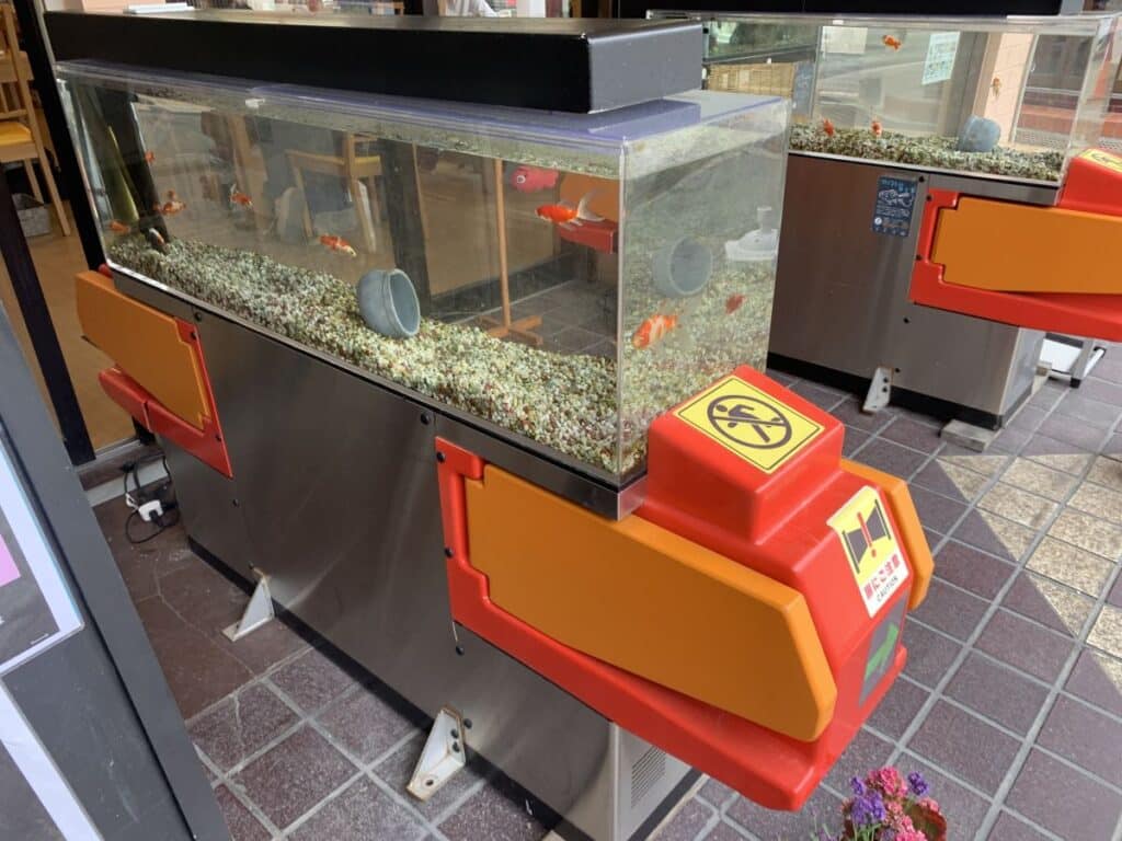 Old ticket turnstiles turned into fish tanks in Yamato Koriyama, near Nara
