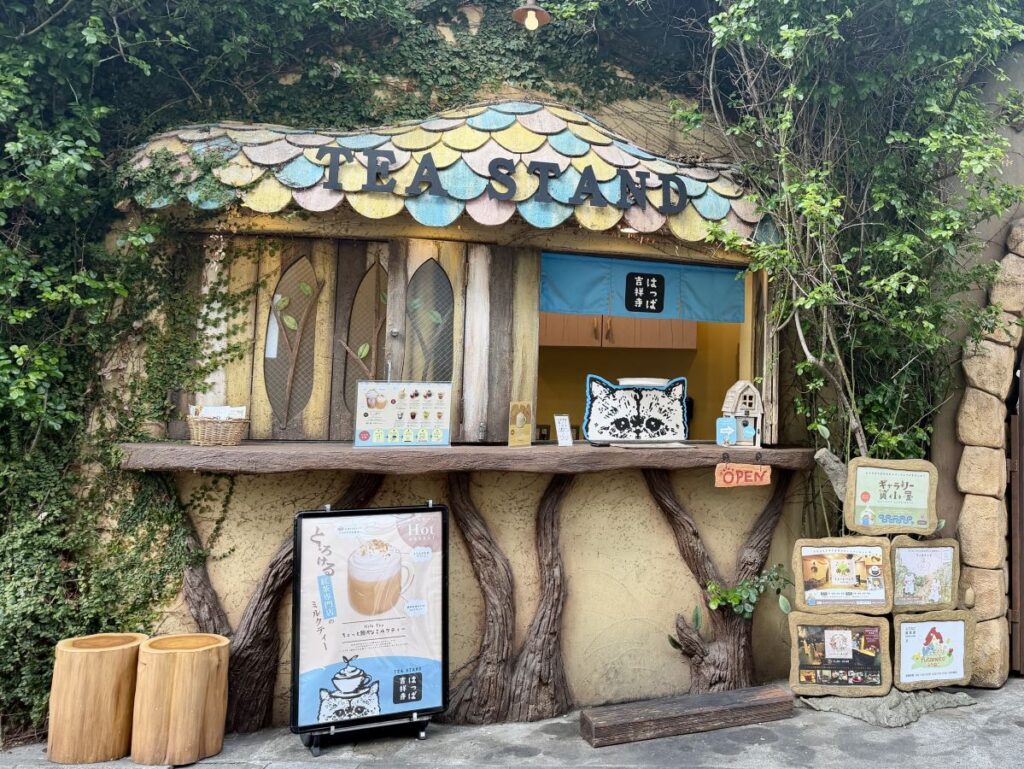 Cute tea stand with a multicoloured tiled roof outside the Petit Mura complex