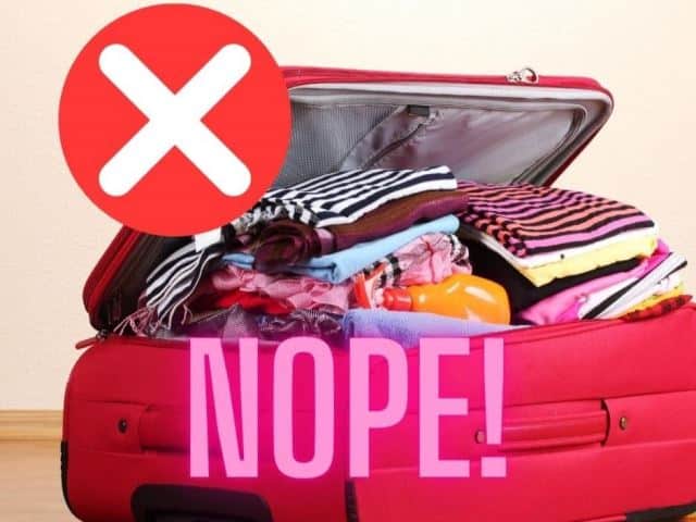 suitcase packed for Japan with the word nope on it