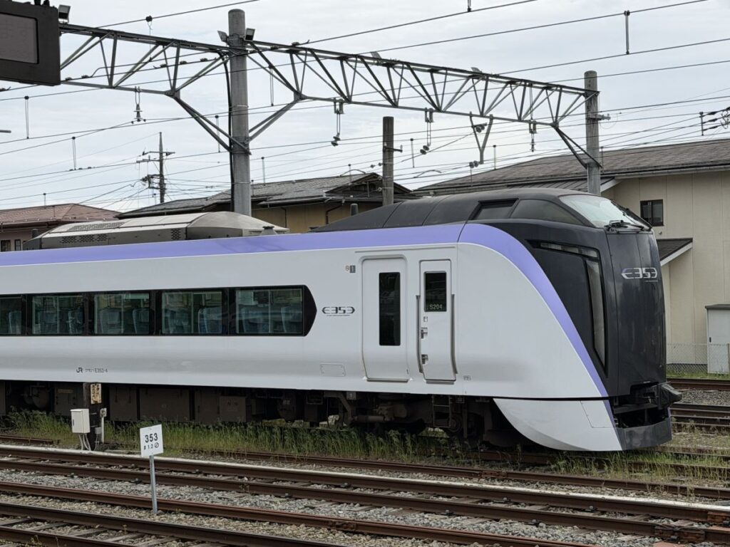 Close up view of The Fuji Excursion train showing the big square windows