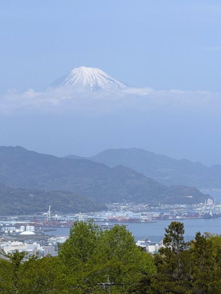 Top of Mount Fuji peaks out of clouds at Nihondaira