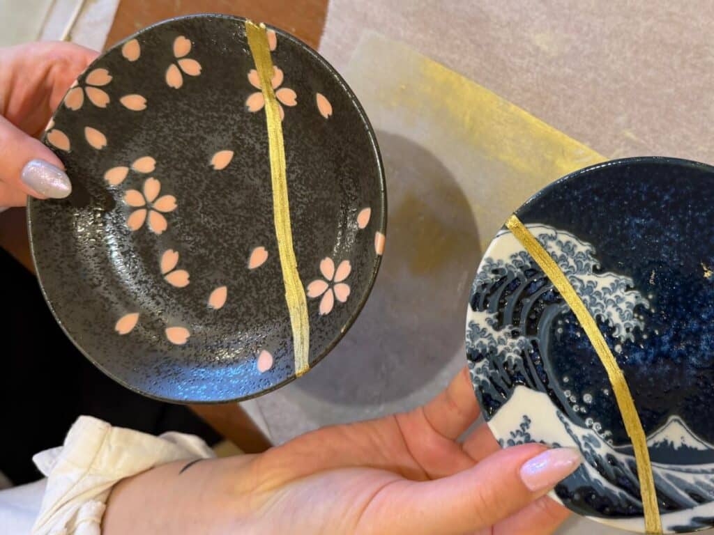Kintsugi bowls mended with gold along their cracks