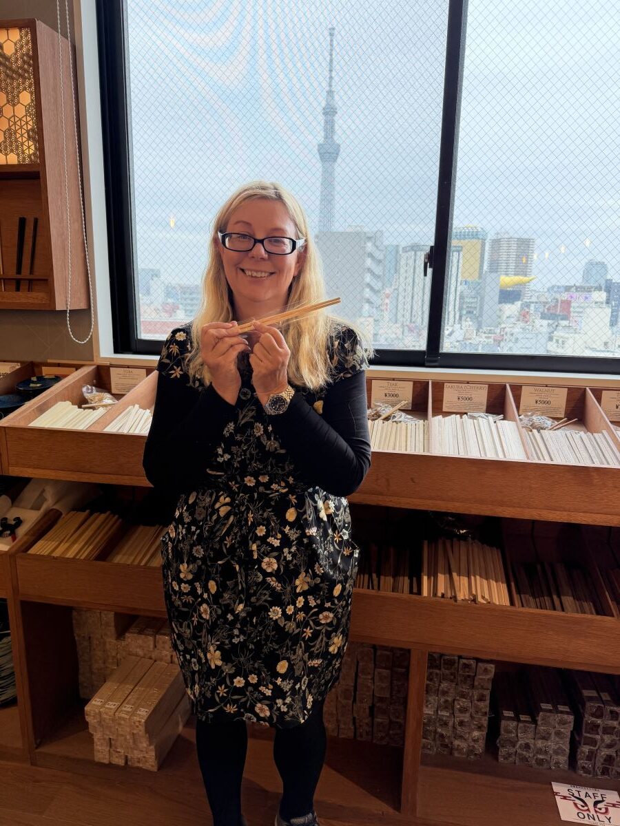 Helen from Japlanease holds up the chopsticks she made