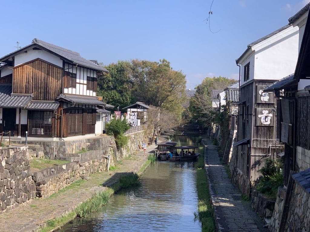 View of the canal in Omihachiman showing tour boats