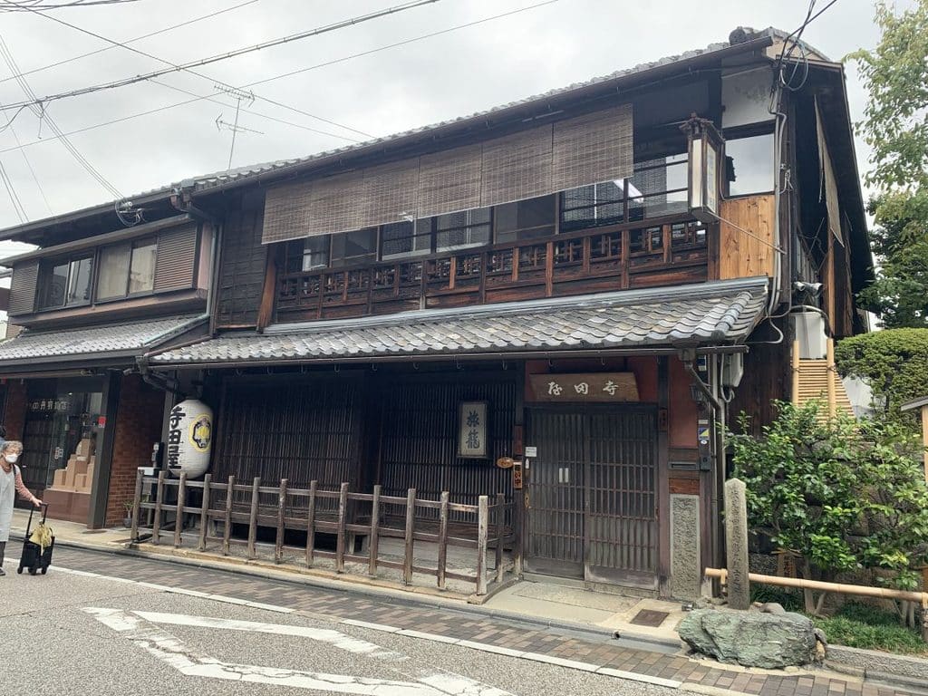 Exterior of the Teradaya Inn in Fushimi - it's a traditional old wooden two storey building
