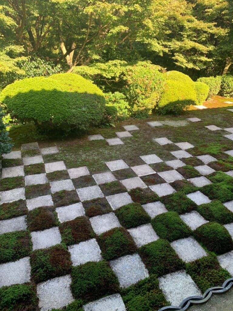 Checkerboard garden in Tofukuji in Kyoto - white pavers alternate with green moss squares