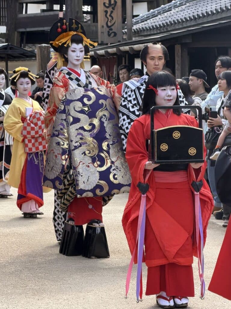 Oiran parade in Edo Wonderland showing the oiran's different assistants